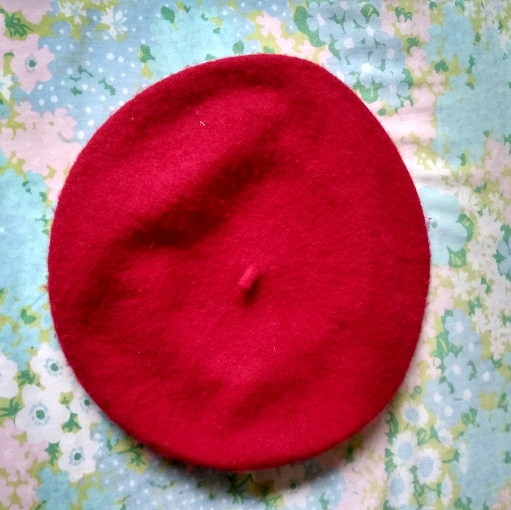 Red beret. Never worn